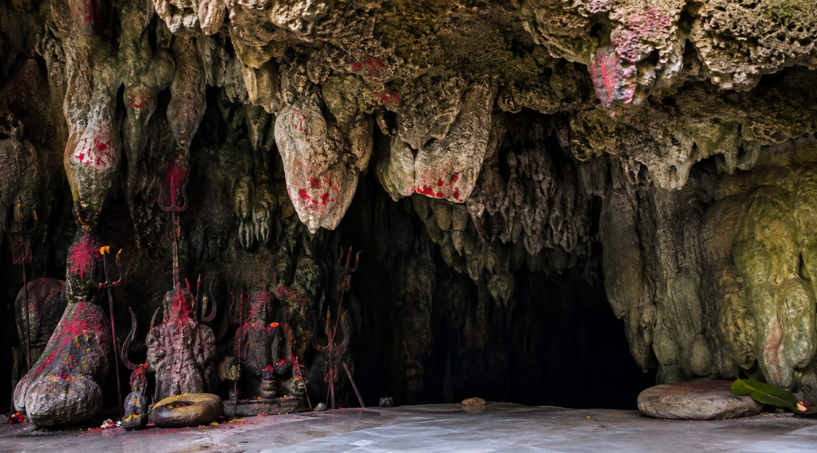 Shiva shrines and stalactites inside Mahakal Cave above Jayanti